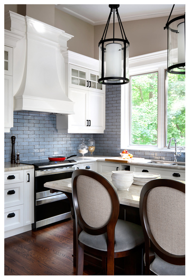 ...The key is to choose a color that pops against the color of the cabinetry, the ceiling and the backsplash, for maximum impact.
Design by Laura Stein Interiors; Photography by Brandon Barre via Dering Hall
