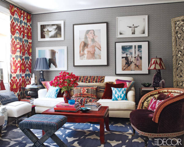 The living room of São Paulo–based designer Sig Bergamin’s Manhattan apartment. The ottoman, linen-covered chairs, and velvet armchair, which has a back upholstered in a Braquenié cotton, are by Bergamin. The photograph of Gisele Bündchen is by Michel Comte; the antique bone-inlaid screen was found in India.
See more red, white and blue rooms.